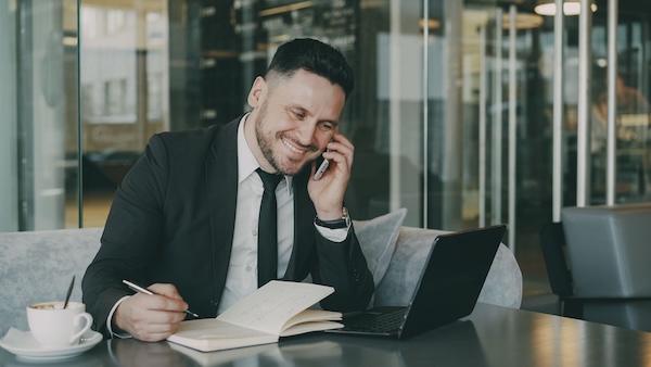 Property Manager on the Phone with a Client